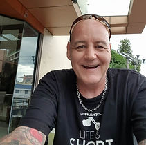 Note the T-shirt.