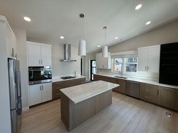 Beautiful Kitchen with a modern flair. A mix of colors with linear accents.