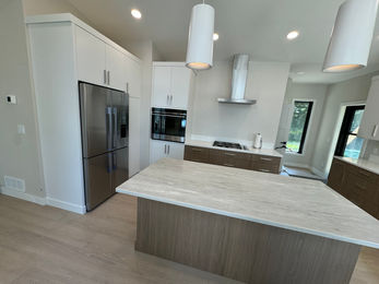Beautiful Kitchen with a modern flair. A mix of colors with linear accents.