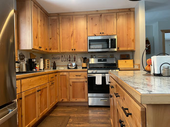 Box Type: Framed Full Overlay (Framed Current)
Wood Species: Knotty Alder
Door Style: Meadowland
Finish: Natural
Interiors: Maple Melamine