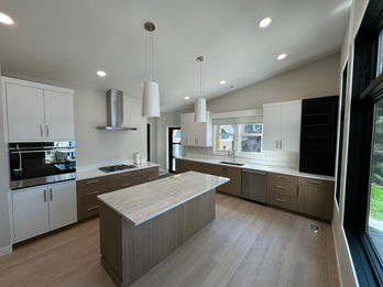 Beautiful Kitchen with a modern flair. A mix of colors with linear accents.