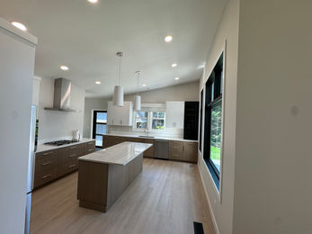 Beautiful Kitchen with a modern flair. A mix of colors with linear accents.