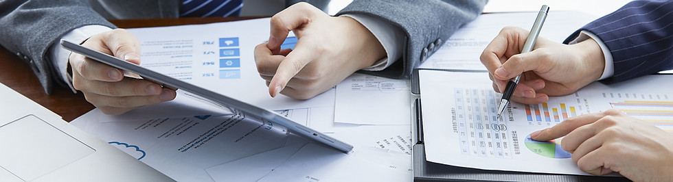 businessmen-elegant-suits-business-meeting-discussing-new-project-office 1