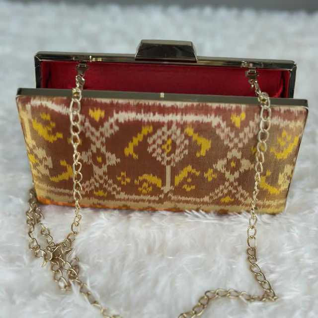 Thumbnail: Patola Clutch Button