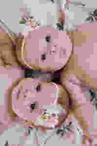twin girls with flower headband on flower blanket