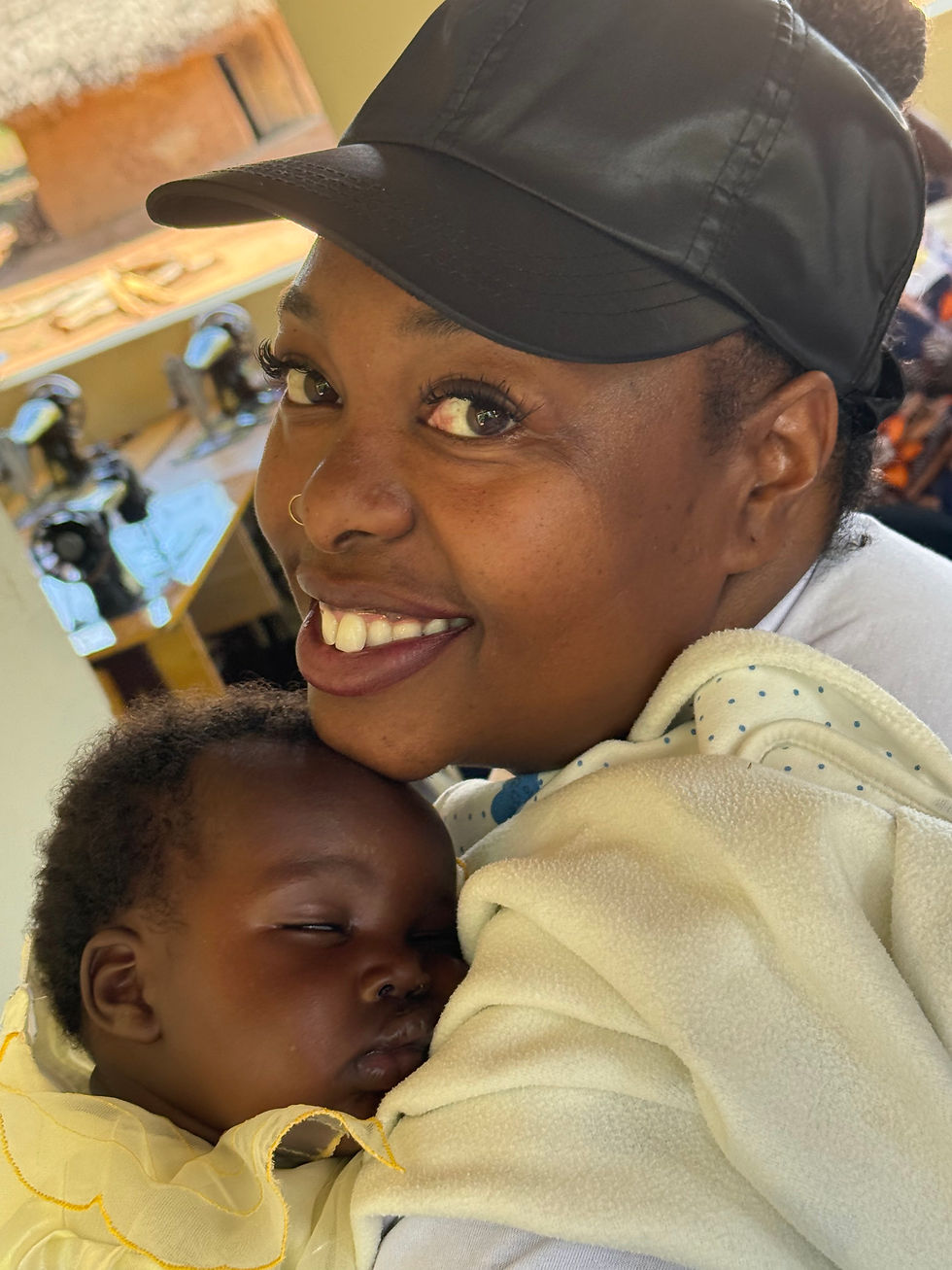 Shutaveya Loving on a Baby