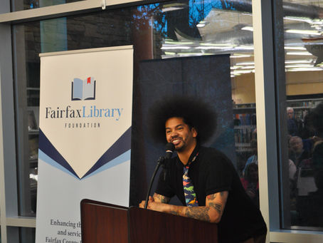 Social media sensation Mychal Threets speaks to attendees at Fairfax Library Foundation’s 30th Anniversary fundraiser.