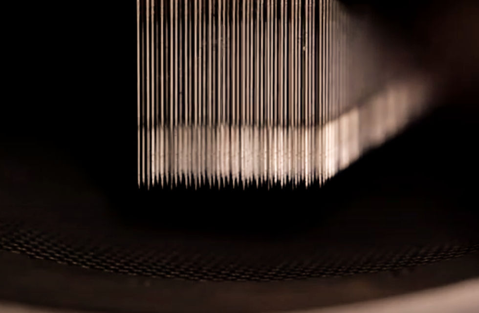 What is the 'needle punch' process?