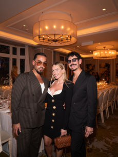 Group of stylish guests at the Sellier new store opening, captured by London event photographer Margot Jakobson in a warm, candlelit event setting.
