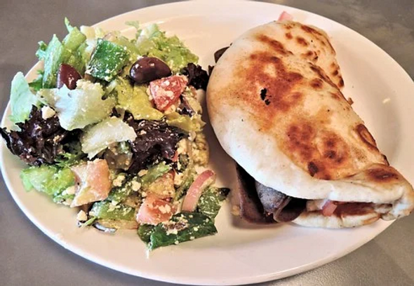 CURRIED BEEF PITAS WITH CUCUMBER SAUCE
