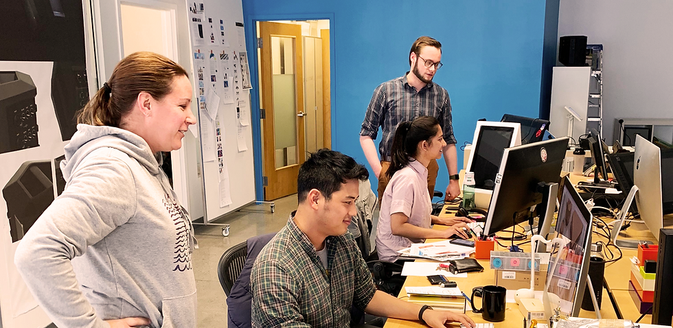 Team of engineers working on the design of Brilliantly Warm's wearable warming device.