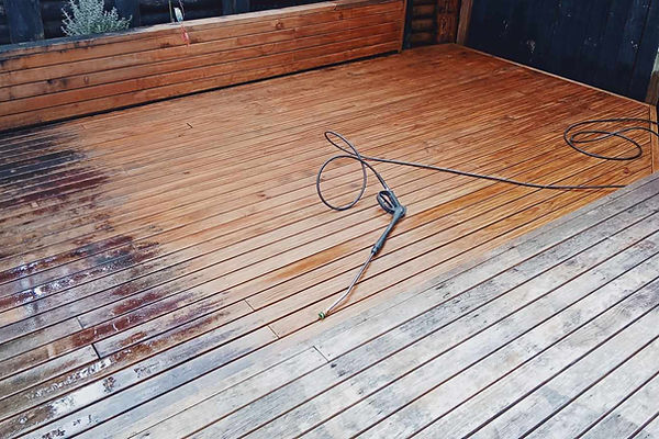 A water blaster resting on a deck during smoko in Auckland.
