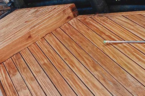 After shot of mossy Auckland deck when water blasting has been done.