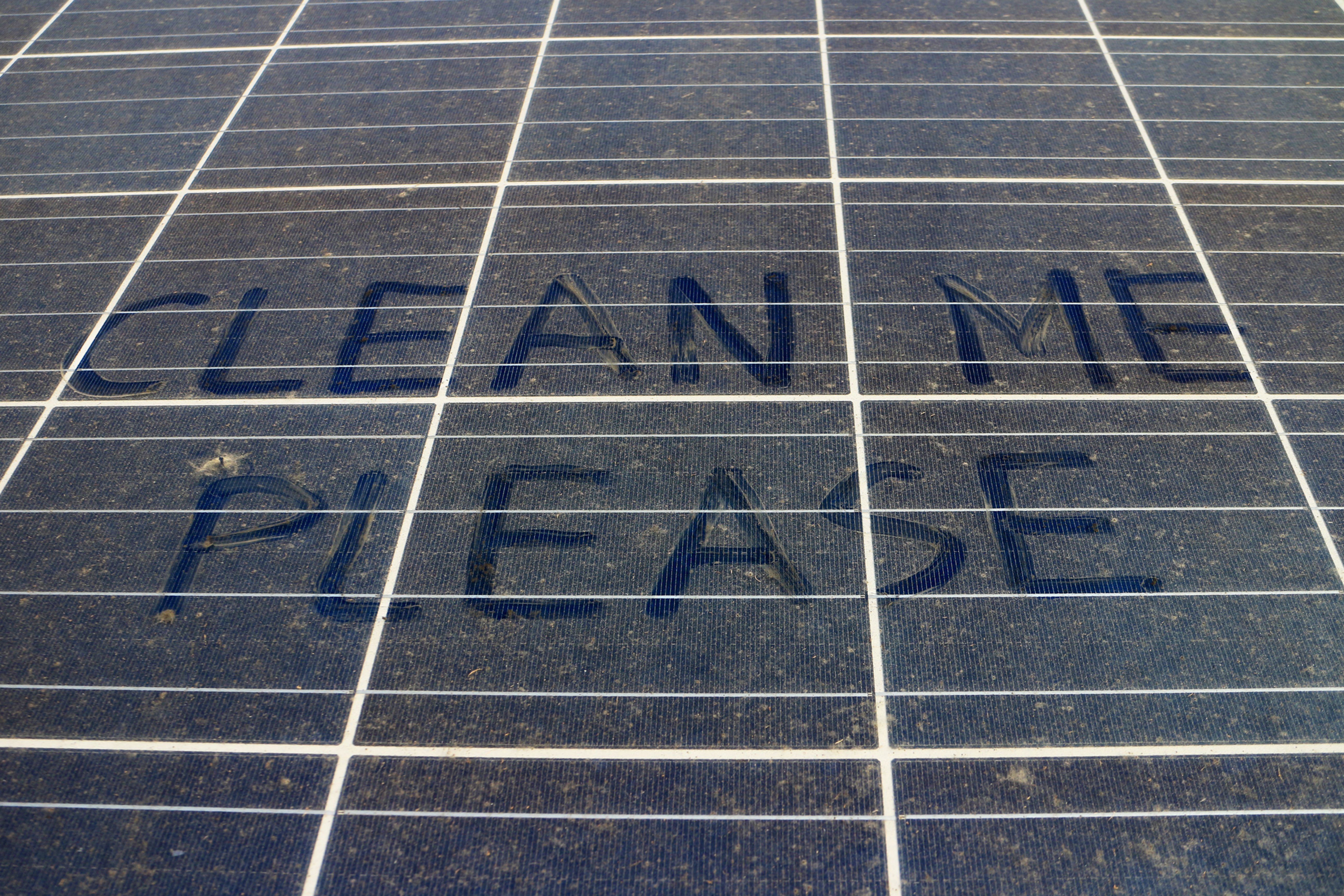 Dirty solar panel requesting a wash