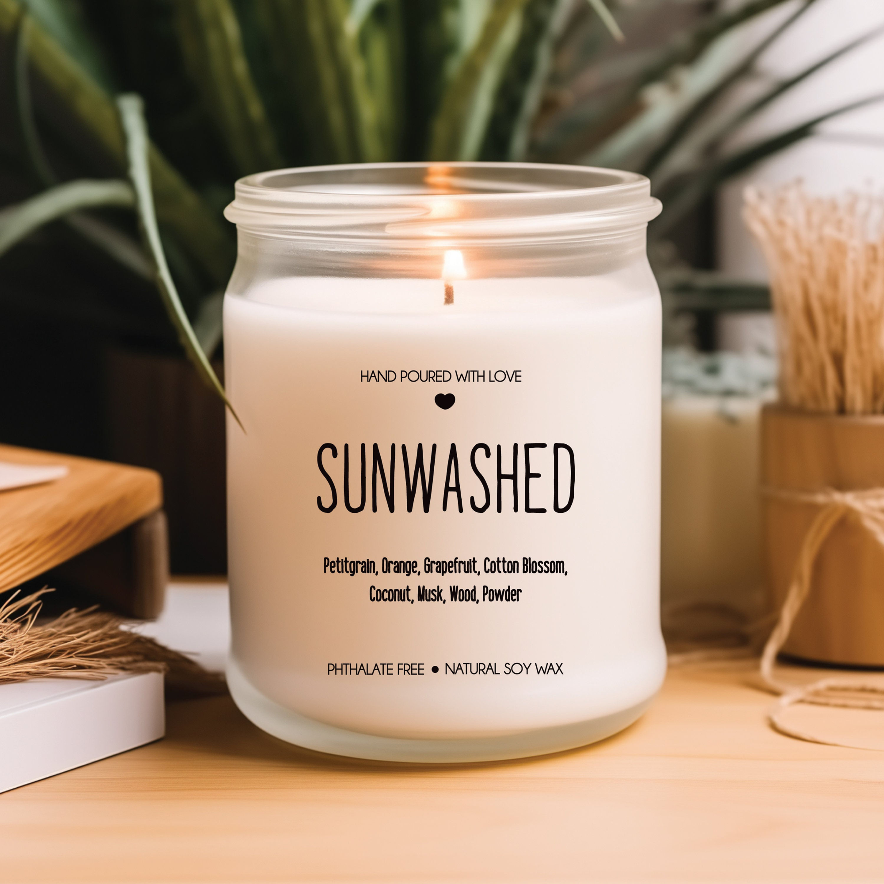 Sunwashed soy candle in clear jar with bright citrus and ocean scent
