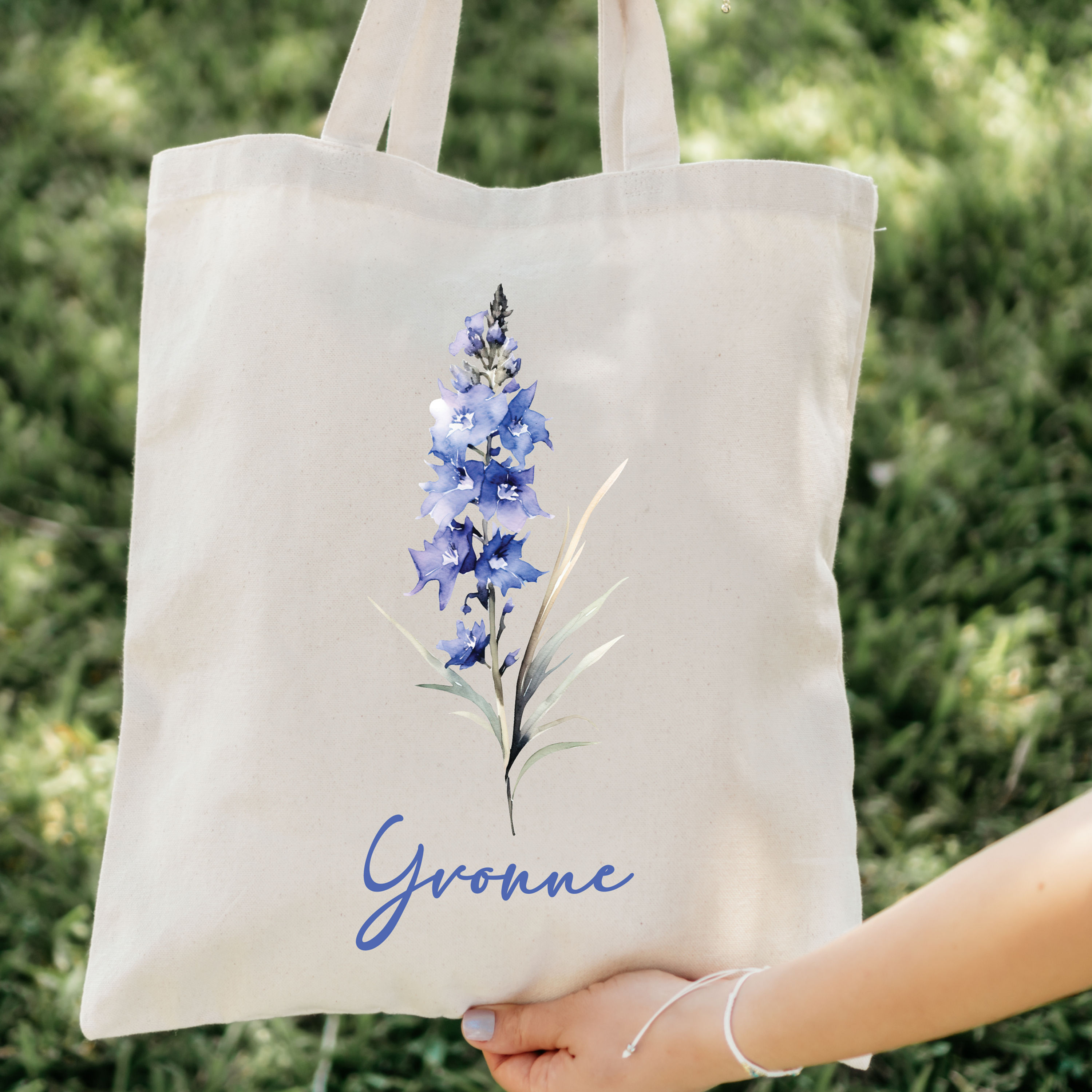 Cream tote: Cream tote featuring July larkspur flower and personalized name