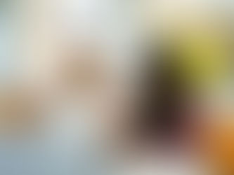 A woman tutoring a high school female student