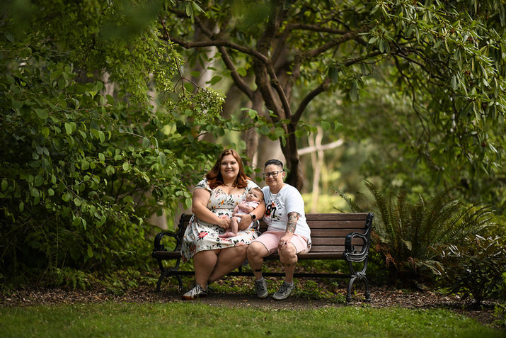 Smiling family embracing outdoors | Best Oregon family photography