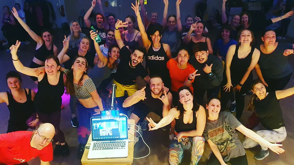 A big group of smiling people after a Zumba with Mon zumba class