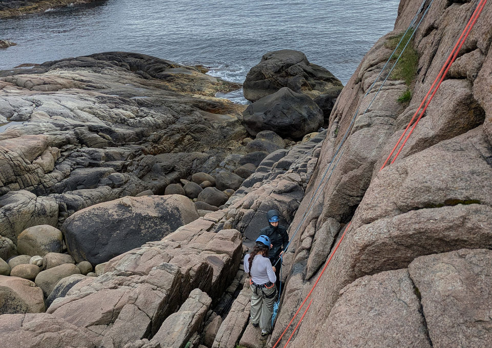 Fun group climbing activity in Henningsvær Lofoten Norway