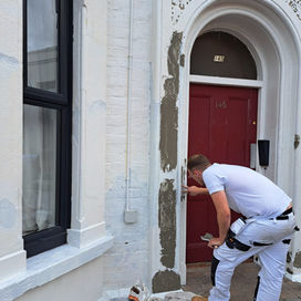 filling in damaged area of a building