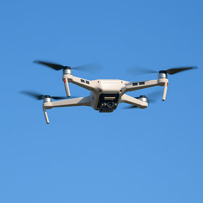 drone flying in blue sky suitable for background on website.jpg
