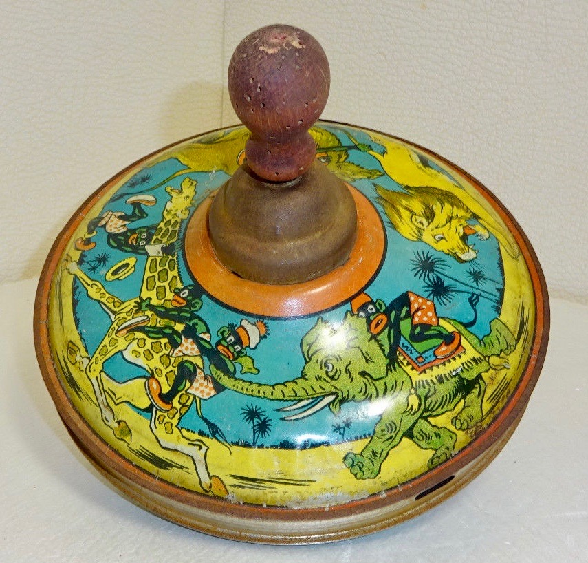 Toupie en tôle ancienne