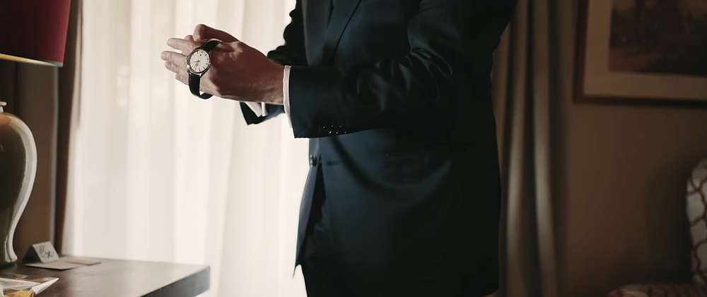 Close-up of groom preparing for the wedding ceremony