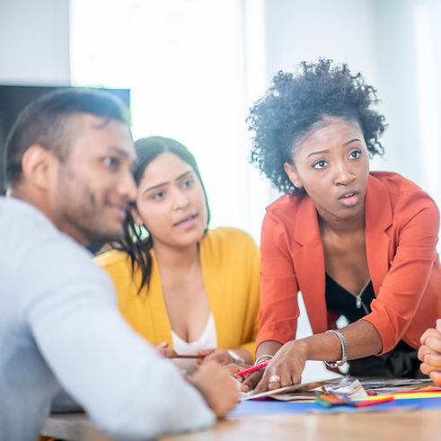 Diverse group of colleagues working together in a leadership development environment