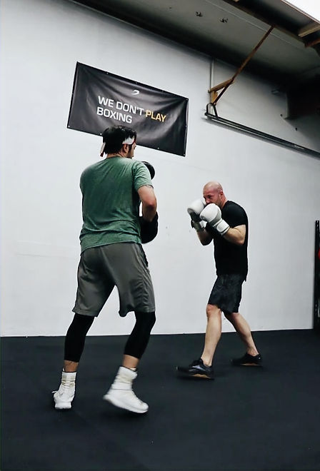 Small group boxing class at Empower Boxing Club in Denver