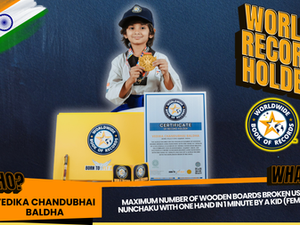 Maximum Number Of Wooden Boards Broken Using Nunchaku With One Hand IN 1 MINUTE By A Kid (Female)-Achieved By Vedika Chandubhai Baldha