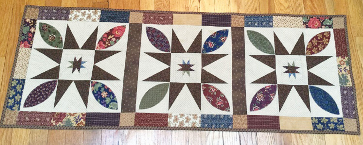 Blooming Stars Table Runner Quilting Pattern by Cut Loose Press