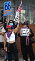 No Kings protestors line up in the Historic Filipinotown neighborhood of downtown Los Angeles