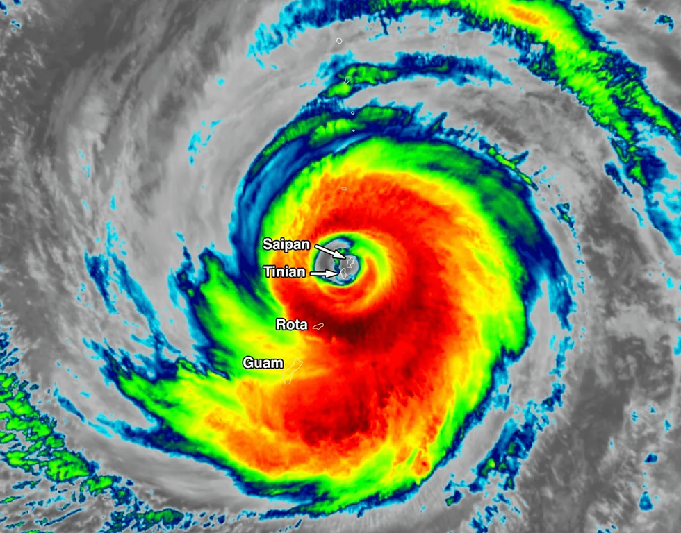 An infrared image shows powerful typhoon swirls across the Northern Mariana Islands
