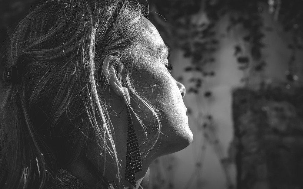 dramatic black and white photo of woman