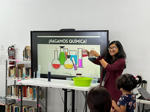 Dr. Chelsea Anorma doing a demonstration at a workshop
