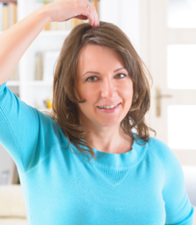 woman practicing tapping on herself