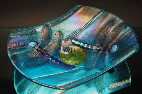Fused glass platter featuring dragonfly and botanical imagery