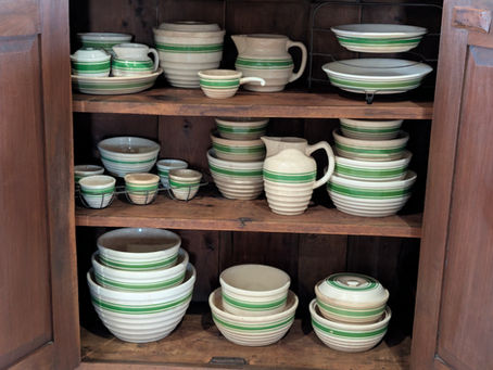 Large collection of vintage Hull Pottery Beehive 300 Line kitchenware with green stripes