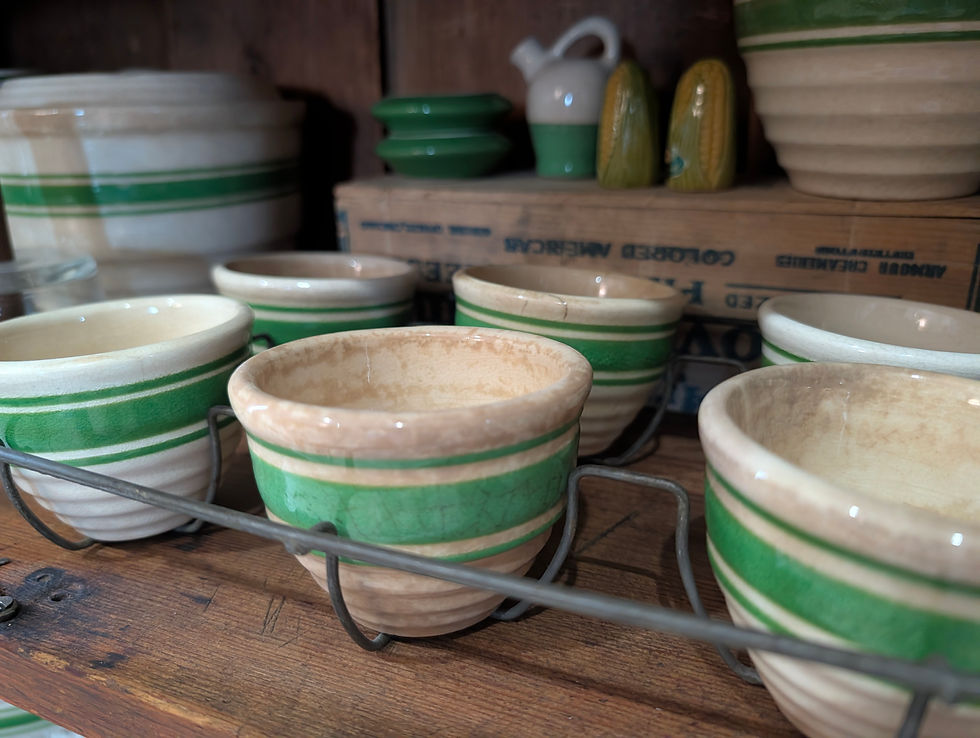 Spring Green Hull Beehive custard cups in a wire rack.