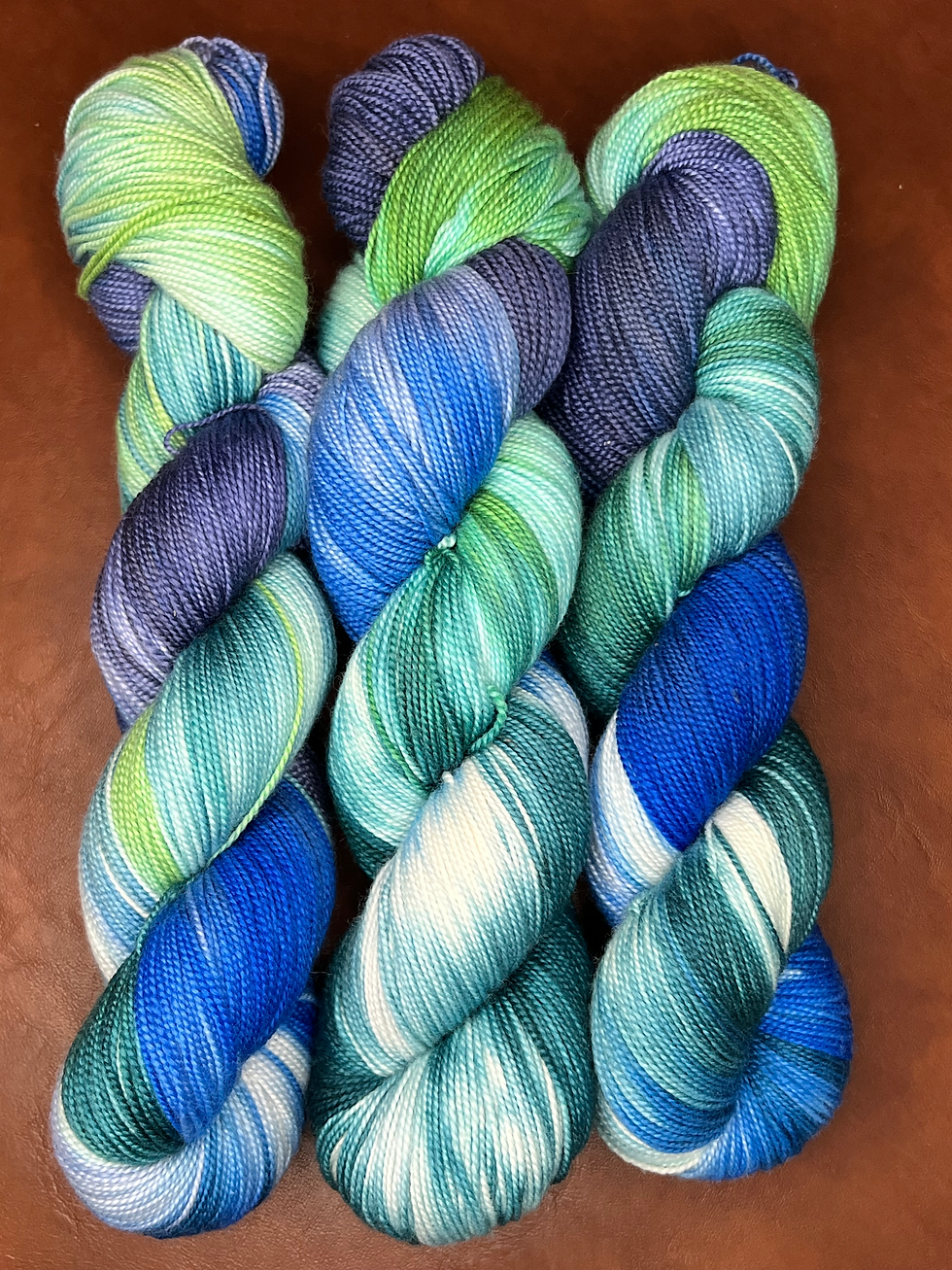 3 Skeins of wool silk blend in blues, teal, and green