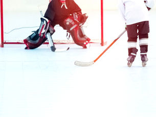 Camp de Hockey : Techniques de Patinage et Stratégies de Jeu