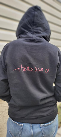 Black hoodie with Hello Love branding