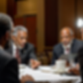 highly_distinguished_jamaican_gentlemen_discussing_company_shares_at_a_boardmeeting_with_a