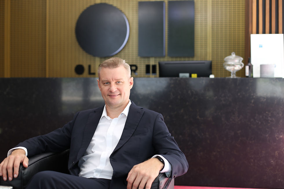 Oliver Hume Chief Economist Matt Bell seated in an office