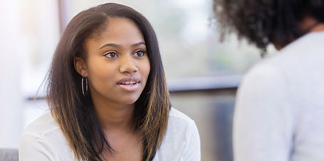 young-woman-talks-to-attentive-therapist-royalty-free-image-1596745532.jpg
