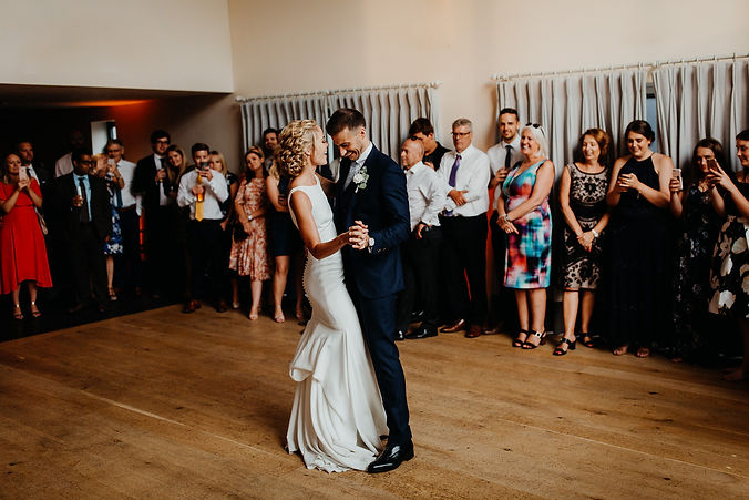 couple having first dance at millbridge court wedding venue.jpg