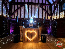 Wedding DJ set up with mirror ball at Great Fosters