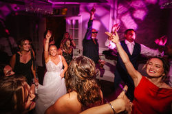 Bride dancing with her wedding party