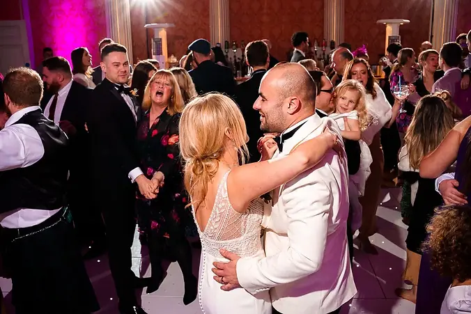 Dancing to wedding DJ at Stowe House.jpg